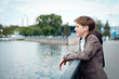 Portrait of teenager on background of river