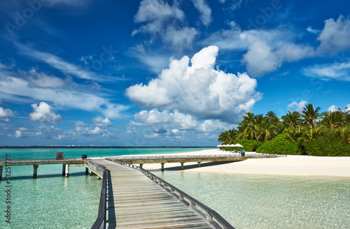 Photo: Beautiful beach with jetty Beautiful beach with jetty
