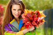 autumn woman on leafs background