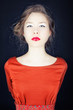 Portrait of a girl in a red dress