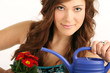 Photo: Frau gießt Blumen Frau gießt Blumen