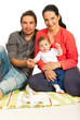 Cheerful family with baby