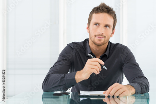 Photo: Pensive Businessman Pensive Businessman
