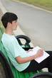 The guy makes entry in a notepad