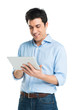 Foto: Happy Young Man Using Digital Tablet Happy Young Man Using Digital Tablet