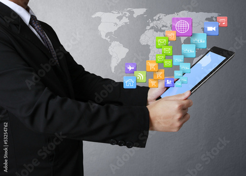 Photo: touch screen ,touch- tablet in hands touch screen ,touch- tablet in hands