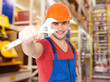 smiling worker with big spanner