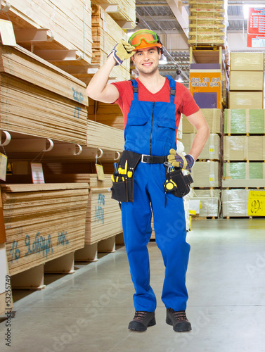 Photo: Portrait of the professional handyman at store Portrait of the professional handyman at store