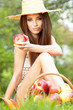 Photo: Apple woman. Very beautiful ethnic model eating red apple in the Apple woman. Very beautiful ethnic model eating red apple in the