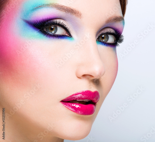 Photo: Beautiful woman with fashion bright makeup Beautiful woman with fashion bright makeup