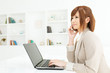 Beautiful young businesswoman working in office