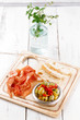 Platter of serrano jamon Cured Meat, Ciabatta, chorizo and olive