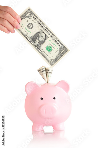 Photo: pink piggy bank with money pink piggy bank with money