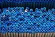 Foto: Stacked plastic pipes and tubes background Stacked plastic pipes and tubes background