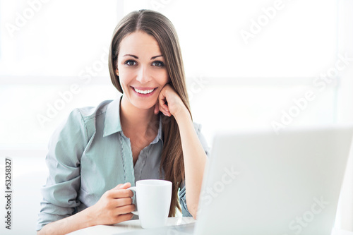 Photo: Businesswoman with laptop Businesswoman with laptop