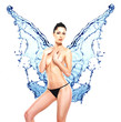 Foto: Beautiful woman body with water splash of butterfly Beautiful woman body with water splash of butterfly