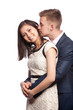 Man kissing his wife's neck