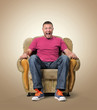 Photo: Emotional male spectator in the chair Emotional male spectator in the chair