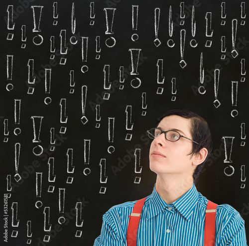 Photo: Nerd geek businessman student teacher chalk exclamation marks Nerd geek businessman student teacher chalk exclamation marks