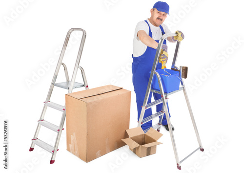 Photo: house painter ladders and cardboard boxes house painter ladders and cardboard boxes