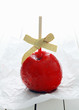 Photo: Festive toffee apple with a bow Festive toffee apple with a bow