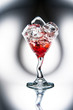 Red cocktail with ice