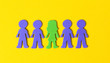Colourful foam people on yellow background