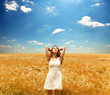 Redhead girl at wheat field