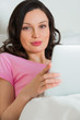 Woman lying on a bed with a tablet pc