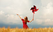 Photo: Redhead girl with toy wind turbine Redhead girl with toy wind turbine