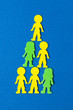 Colourful stacked  foam people on blue background