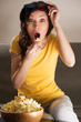 Photo: Shocked young woman watching 3D movie Shocked young woman watching 3D movie