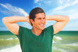 Handsome young man at beach background