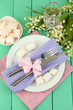 Table setting in violet and pink tones