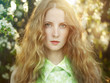 Beautiful young woman in summer garden