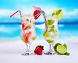 Summer drinks with blur beach on background