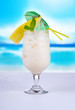 Summer drink with blur beach on background
