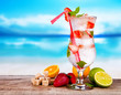 Summer drink with blur beach on background