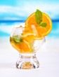 Summer drink with blur beach on background
