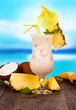 Summer drink with blur beach on background