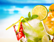 Summer drinks with blur beach on background