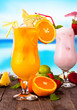 Summer drinks with blur beach on background