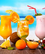 Summer drinks with blur beach on background