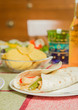 Traditional mexican food with a plate of chicken fajita, fresh s