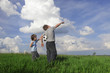 Photo: two boy look in sky with ball. two boy look in sky with ball.
