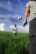 two boy play in ball outdoors
