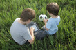 Photo: Boy with tablet pc outdoors Boy with tablet pc outdoors