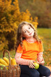 girl with fruit in park