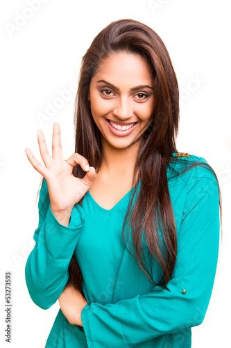 Photo: Beautiful mix race woman showing Ok sign Beautiful mix race woman showing Ok sign