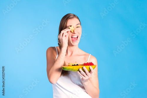 Photo: Healthy nutrition - young woman with fruits Healthy nutrition - young woman with fruits